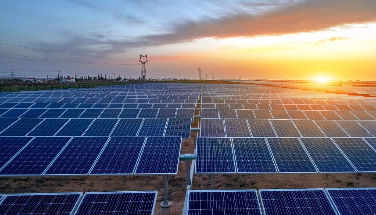 Outdoor solar photovoltaic panel in the sunset Outdoor solar photovoltaic panel in the sunset