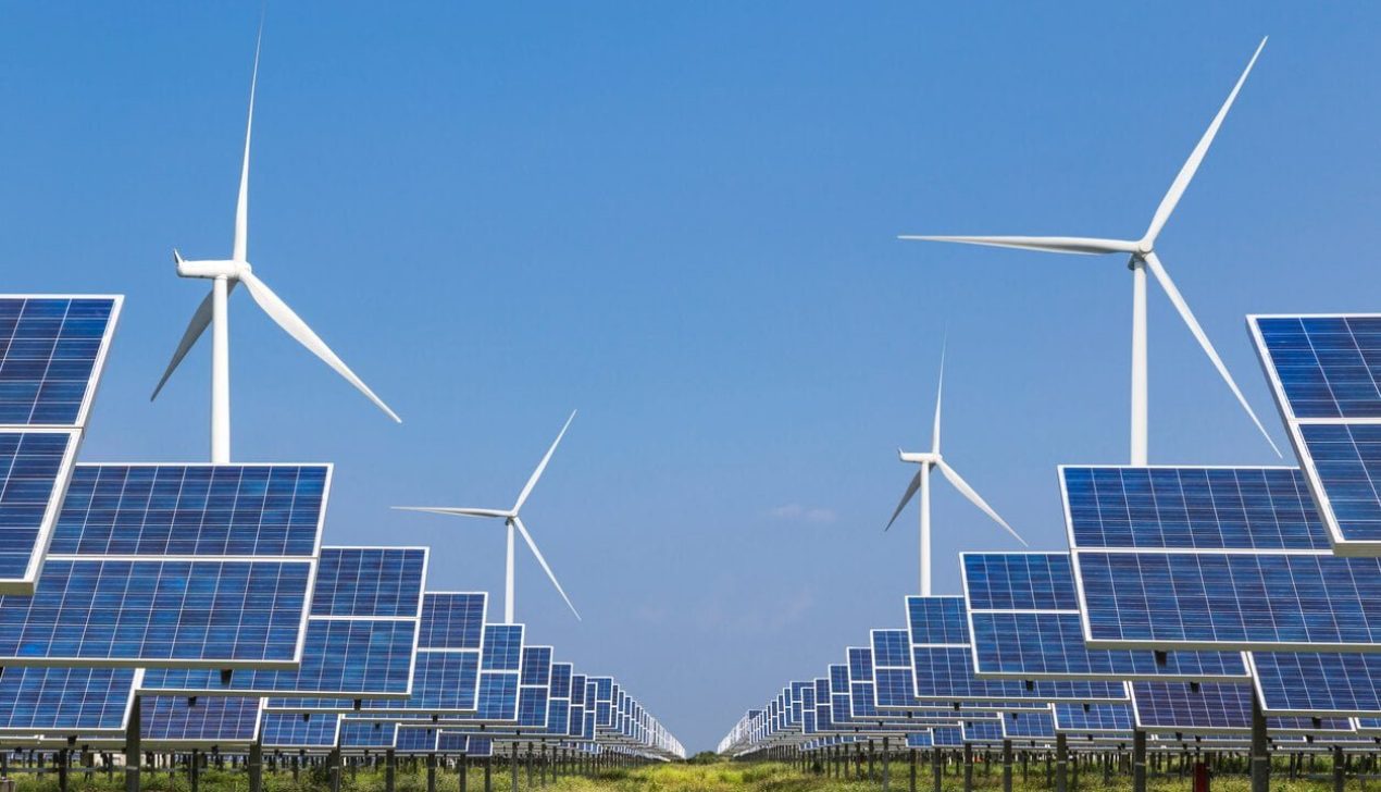 photovoltaics solar panels and wind turbines photovoltaics solar panels and wind turbines generating electricity alternative energy from nature Ecology concept.
