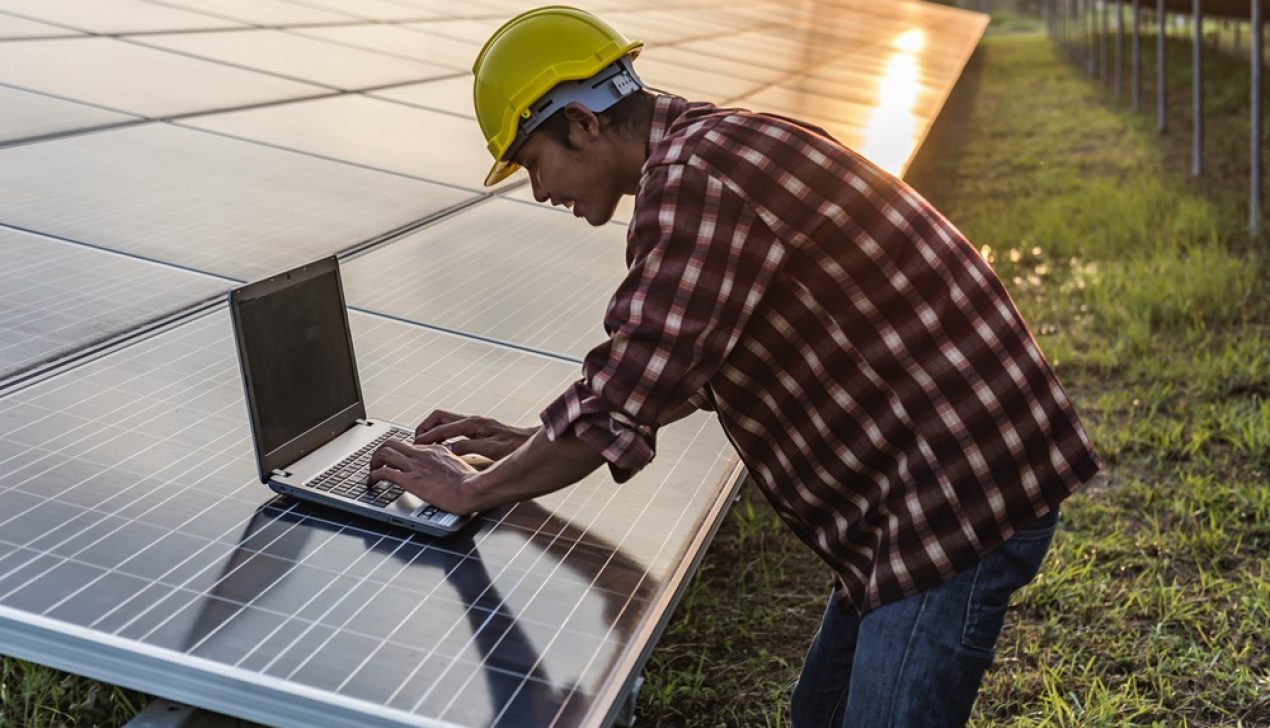 Solar panels with technicians. Solar panels with technicians.